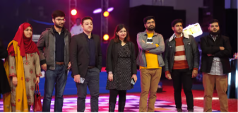 Team on stage at an awards night